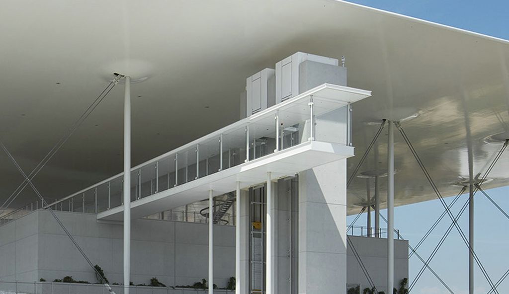 a white building with a white roof