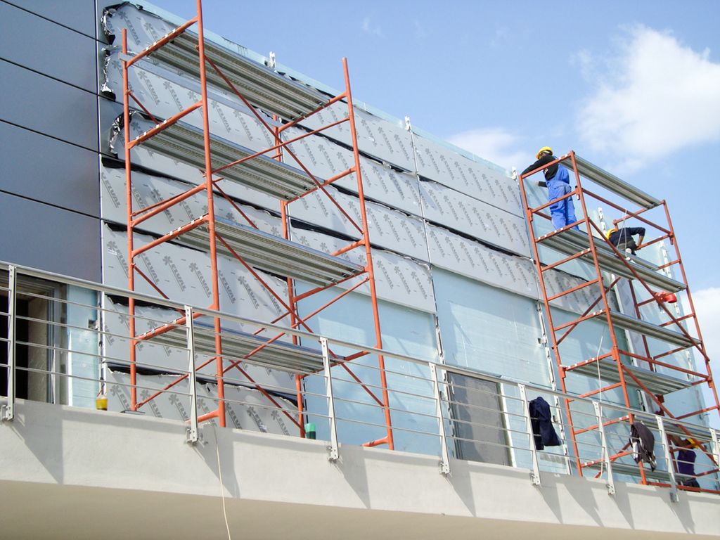 a group of men on a building