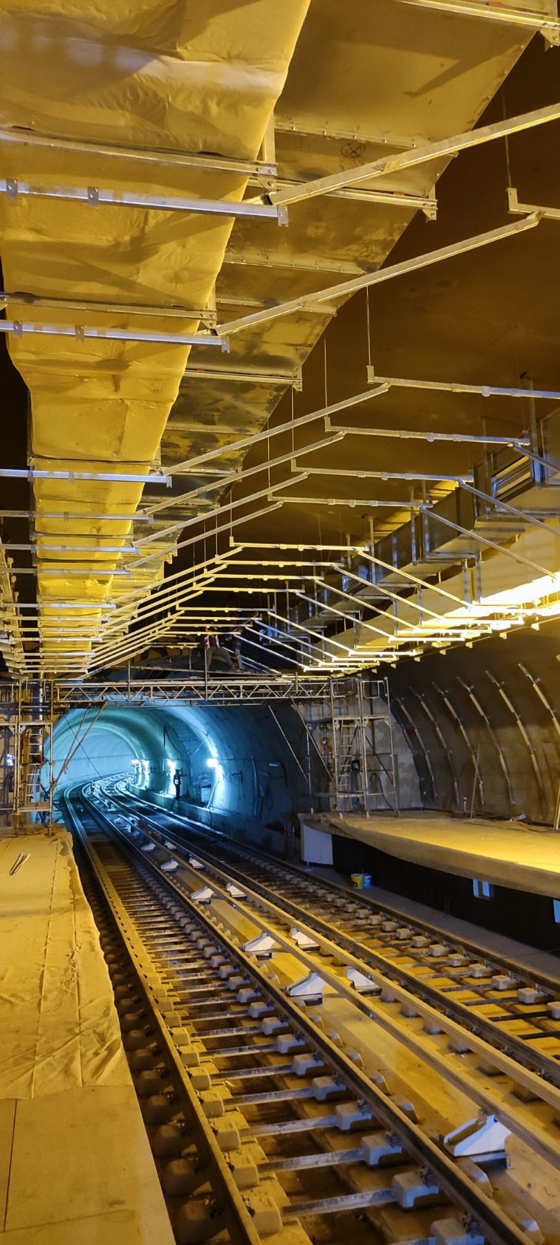 a large room with many metal pipes